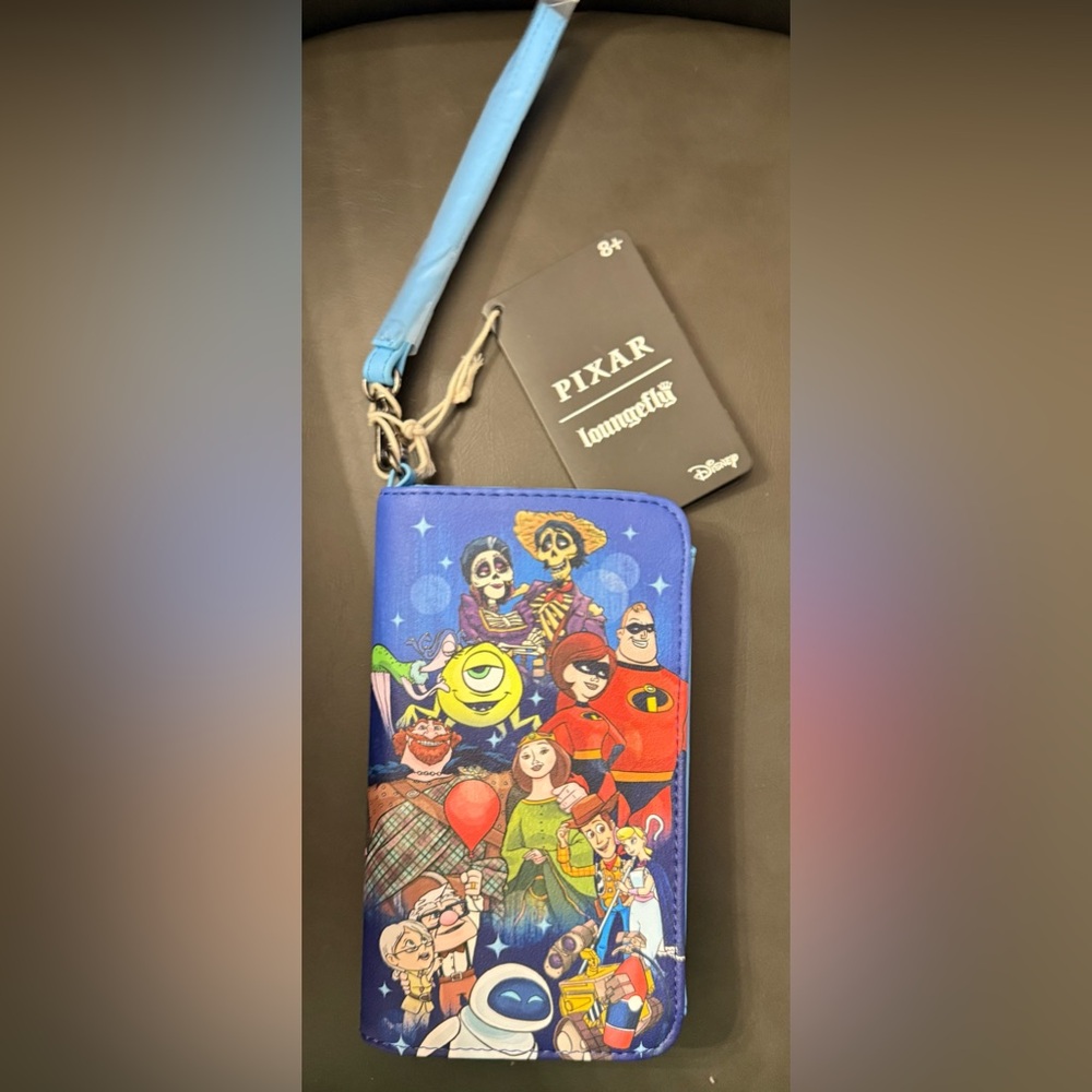 Loungefly NWT Pixar Character Wallet with wrist strap